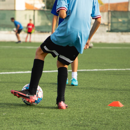 jovens jogadores de futebol a treinar na Sports Academy
